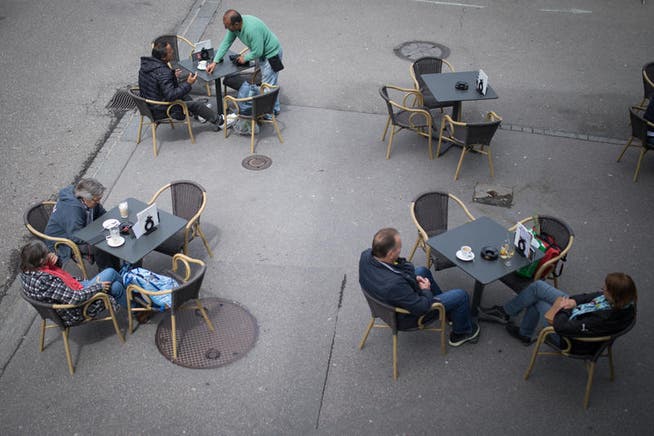 Back to the garden bar: People enjoy life outside in St.Gallen on Saturday.